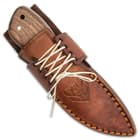 The 6 3/8” overall fixed blade knife can be conveniently carried and stored in its genuine, brown leather belt sheath