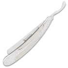 The sleekly curved handle features genuine pearl inlays in decoratively etched handle scales with a polished finish