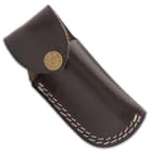 The pocket knife is 4”, when closed, and can be stored and carried in its premium leather belt sheath with embossed artwork