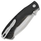 The tactical pocket knife is 4 3/4”, when closed, and it has a stainless steel pocket clip and also features a lanyard hole