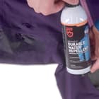 Made in the USA, the spray-on treatment restores durable water repellency, resists abrasion and repels water, oil and stains