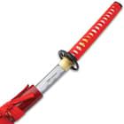 The Shinwa Crimson Defender Katana's handle, blade and scabbard