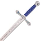 The high-quality, 46 2/5”” overall sword has a stainless steel blade and a royal blue handle, wrapped in silver roping