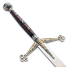 The high-quality, 57” overall sword has a stainless steel blade with a 11 4/5” width and a brown handle with ornamentation
