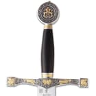 Excalibur has a black and gold finished handle with intricate designs throughout the guard and pommel. 