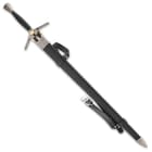 The 48” overall sword slides smoothly into its black faux leather scabbard, which has a metal accents and a shoulder strap