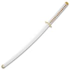 The sword can be carried in its white scabbard.