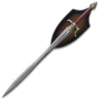 The replica sword displayed on its wooden plaque