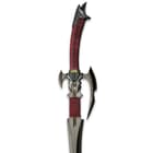 The fantasy sword has a handle grip wrapped in genuine maroon leather and the hilt and guard are sculpted metal