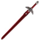 The 46 5/8” overall fantasy sword slides smoothly into its matching blood-red leather covered, wooden scabbard