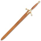 Claymore shown inside tan colored scabbard, matching the spiral hardwood handle,  with two straps securing the sword. 