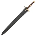 Sword shown strapped into a black leather sheath. 