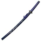 Each of the three samurai swords has a blue coordinating wooden scabbard with dragon design on the side. 
