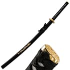 The hand painted scabbard is black with gold dragon design down the side, matching the katana’s gold colored pommel. 