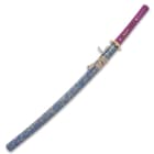 The 41” overall katana slides securely into its purple, spatter-painted wooden scabbard with purple and yellow cord-wrap