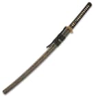 The 41” overall katana slides securely into a black lacquered wooden scabbard, which has a gold spiderweb design