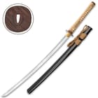 The 39 1/2” overall katana slides smoothly into a black, lacquered wooden scabbard with brown cord-wrap accent