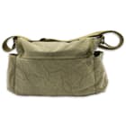 Made of 100 percent cotton canvas in washed olive drab, the bag is as tough as nails so that it will stand-up to hard-use