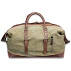 The duffel bag has a travel tough, green canvas construction with a soft, protective lining on the inside and is approximately 13”x 21”