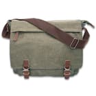 The messenger bag has a travel tough, green canvas construction with a soft, protective lining on the inside and is approximately 14”x 15 1/2”