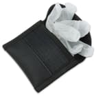 The pouch is constructed of heavy-duty 1680 Denier polyester webbing with hook and loop closures