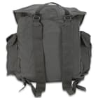 The rucksack has a top carry handle and padded, nylon webbing shoulder straps that can be adjusted with metal buckles