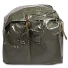 The used condition, transport bag has an olive drab, polyethylene construction with reinforced stitching and metal grommets