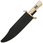 The 19 3/4” bowie knife has a 14” 3Cr13 stainless steel blade, a synthetic ivory handle and a gold-plated guard