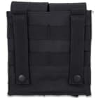 There are two magazine pockets with drain holes in the bottom and stiff top flaps that close securely with Velcro