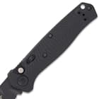 The 4 2/5”, black G10 handle has a milled chevron pattern and it features a mini, deep-carry pocket clip and a lanyard hole