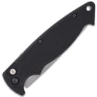 Made in the USA, the automatic-opening pocket knife is 4 1/10”, when close, and it is 7 3/10”, when open