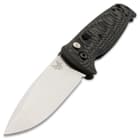 The knife has a 3 2/5”, razor-sharp 154CM steel, drop-point blade with a 58-61 HRC and a satin finish