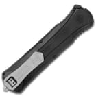 Black aluminium handle with various engravings and grey pocket clip.
