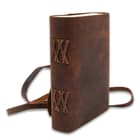 The leather journal can be secured closed with a leather thong