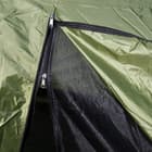 There is an outer, zippered front door and an inside, zippered mesh door for ventilation, hooded by storm flaps