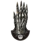 The Gauntlet of Sauron on a themed wooden wall display with limited edition number. 