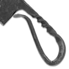 A detailed view of the cleaver's twisted handle