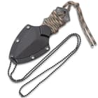 The fixed blade in its neck sheath