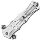 The back of the aluminum handle has cross accents and a pocket clip for easy carrying.
