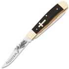 Classic Cross Trapper Pocket Knife has keenly sharp stainless steel blades with a mirror-polished finish with spiritual themed etchings including the Bible verse, John 3:16