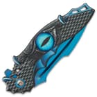 Along with the inset glass dragon eye, the handle features dragon-claw accents around the edges of the textured scales