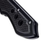 The handle is CNC machined 6061 aircraft aluminum with a black, non-reflective coating and has black carbon fiber handle scales