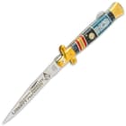 The knife has a razor-sharp, 4” stainless steel blade with laser-etched Masonic artwork and a mirror-polished finish