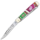 The trapper knife has two sharp 440 stainless steel blades with nail nicks for easy opening and detailed Easter artwork