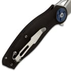 The Mavrokniv Black Spectre Pocket Knife can be carried with its sturdy metal pocket clip