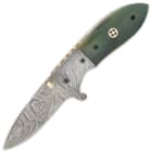 It has a razor-sharp, 3” Damascus steel blade, which can be deployed by using a brass thumbstud or the flipper