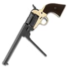 The black powder revolver with its loading mechanism shown