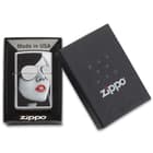 Zippo polished chrome lighter wiht a woman with sunglasses in the case