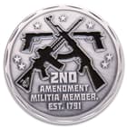 The 1 5/8” diameter coin is expertly crafted of metal alloy, with an antique silver finish, and features a detailed 3D relief on both of its sides