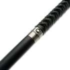 genuine, black leather-wrapped grip above a wooden shaft with a rubber toe